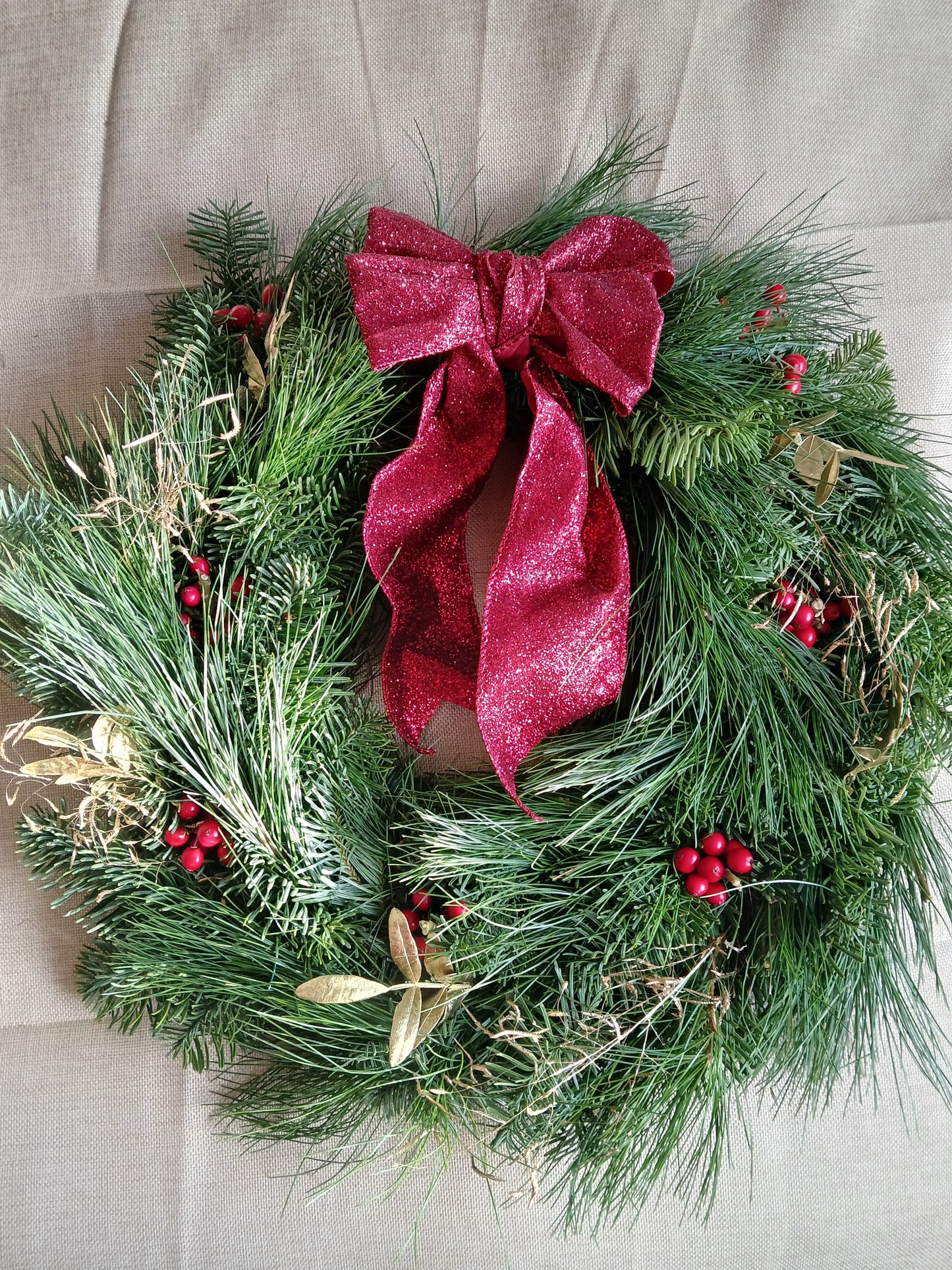 Real Christmas Door Wreath, Pre-order for delivery for december on the Wirral, Liverpool, Chester, or make your own real spruce wreath at our wreath making workshop at bloomies coffee